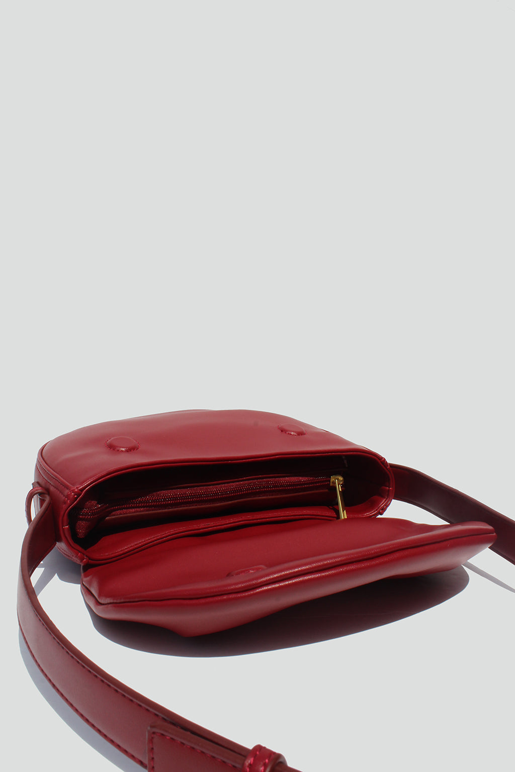 Fleur Half Moon Faux Leather Crossbody Bag in Dark Red