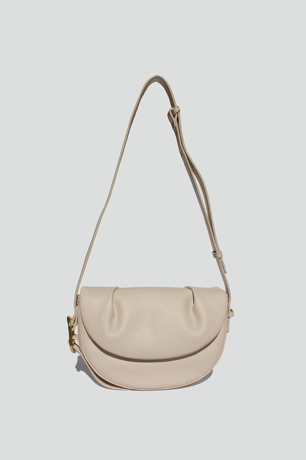 Fleur Half Moon Faux Leather Crossbody Bag in Ivory