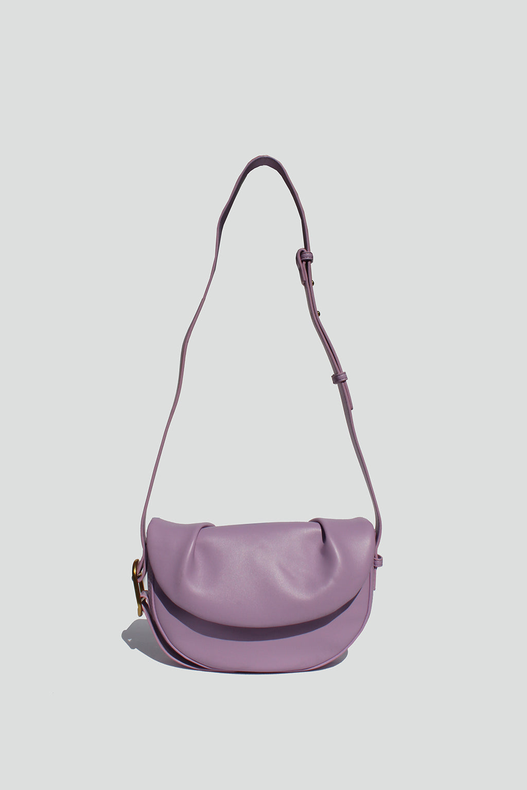 Fleur Half Moon Faux Leather Crossbody Bag in Lilac